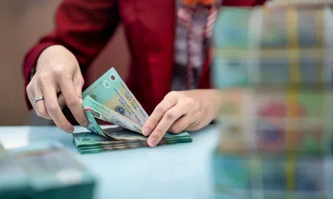 Kho bạc đôn đốc chi trả quà Tết 400.000 đồng/người đúng hạn